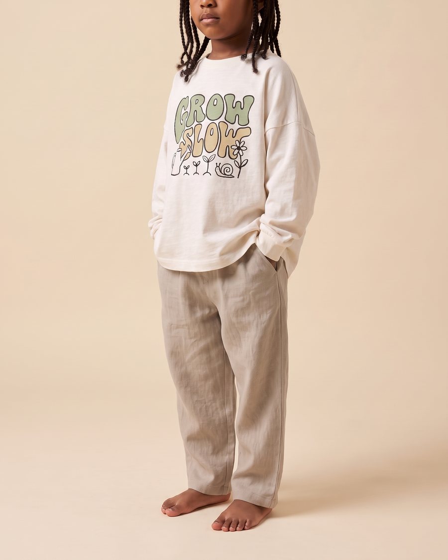 Stella McCartney Kids SS23: Grow Slow long-sleeve on a child